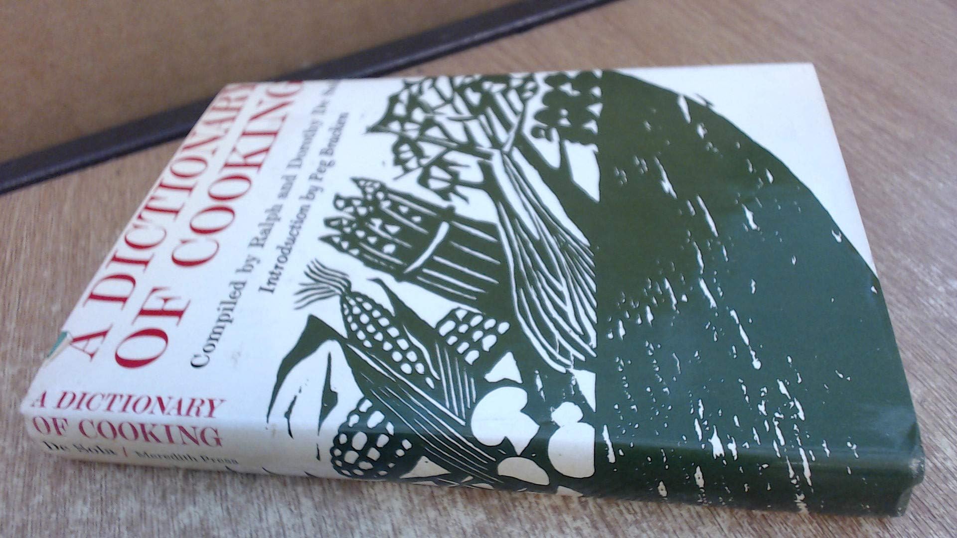 A dictionary of cooking;: Approximately eight thousand definitions of culinary ingredients, methods, terms, and utensils, Hardcover – January 1, 1969