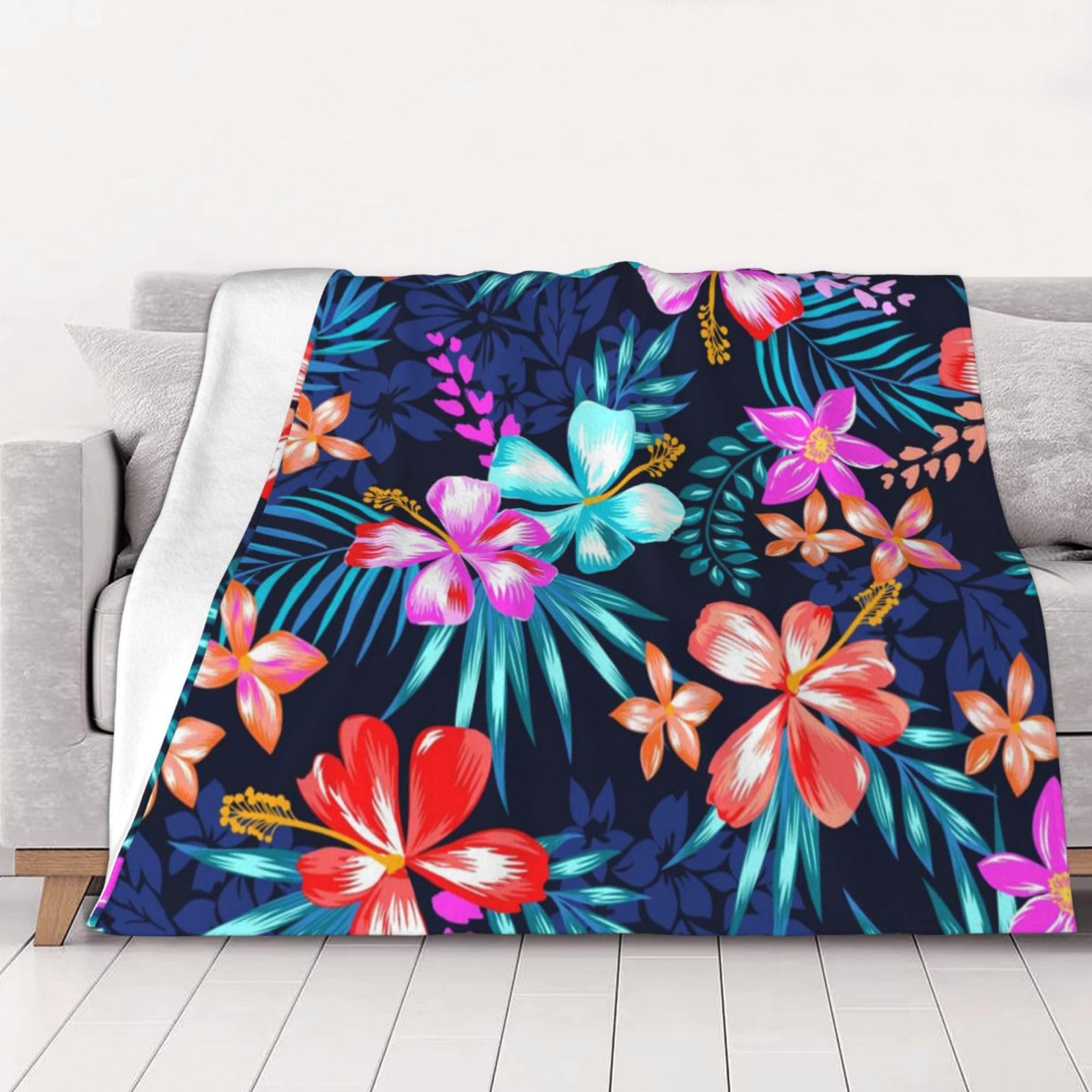 Couverture flanelle bleue au motif floral 200x150cm pour vos soirées cocooning sur le canapé