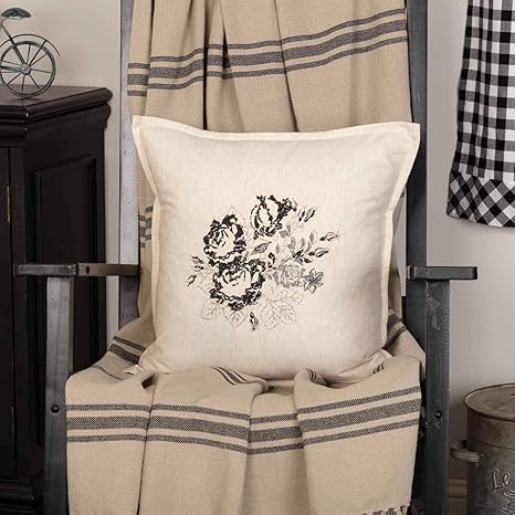 black floral throw pillow