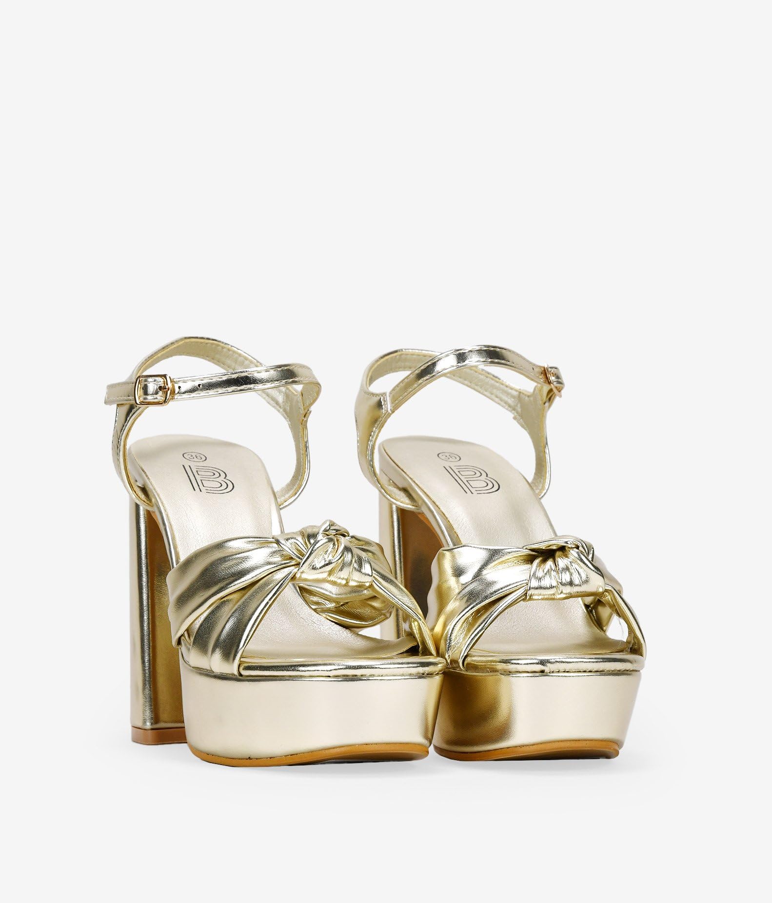 BOSANOVA Sandali da festa in oro metallizzato con dettaglio a fascia anteriore annodata e tacco XXL da 12,5 cm. Chiusura con cinturino sottile con fibbia alla caviglia. Scarpe da donna