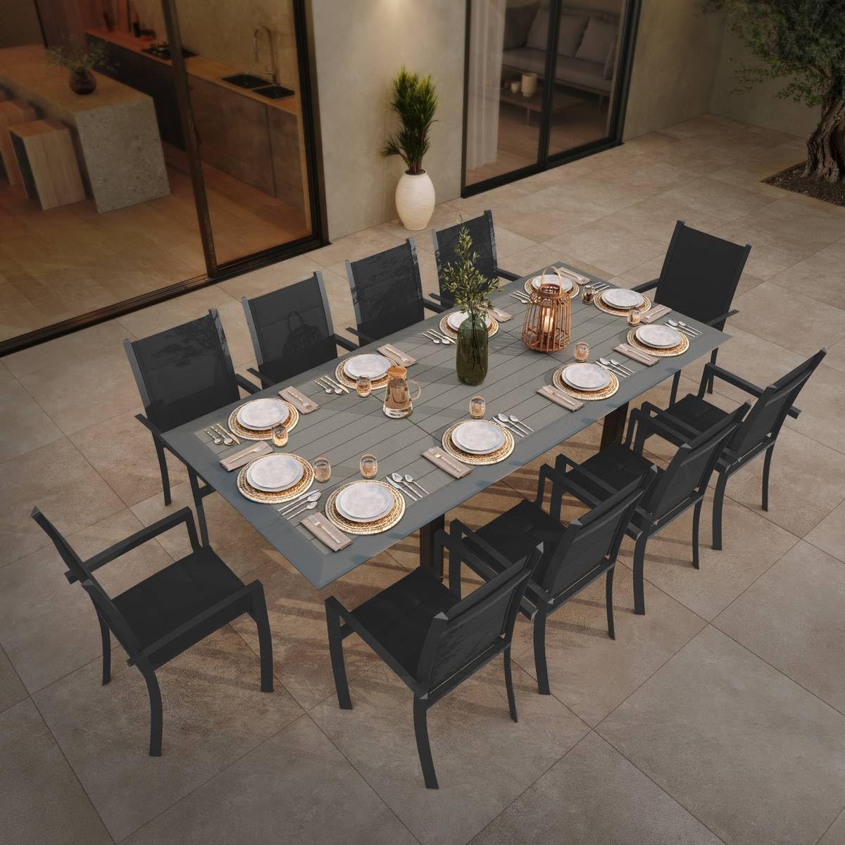 Close-up view of the Hespéride Allure table surface, showing the wood-effect aluminum slats and graphite frame.