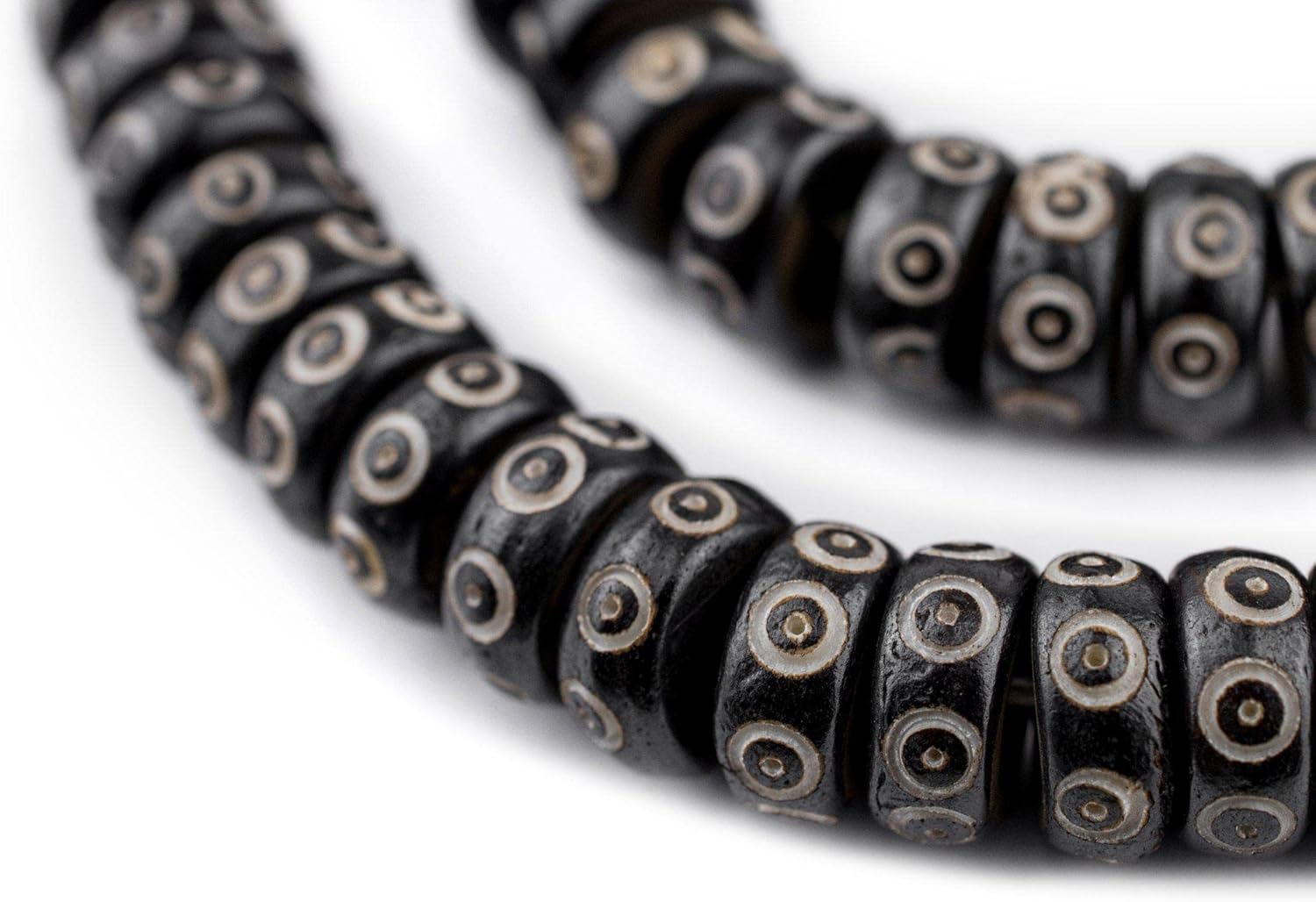 The Bead Chest Black Carved Eye Disk Bone Mala Beads (12mm)