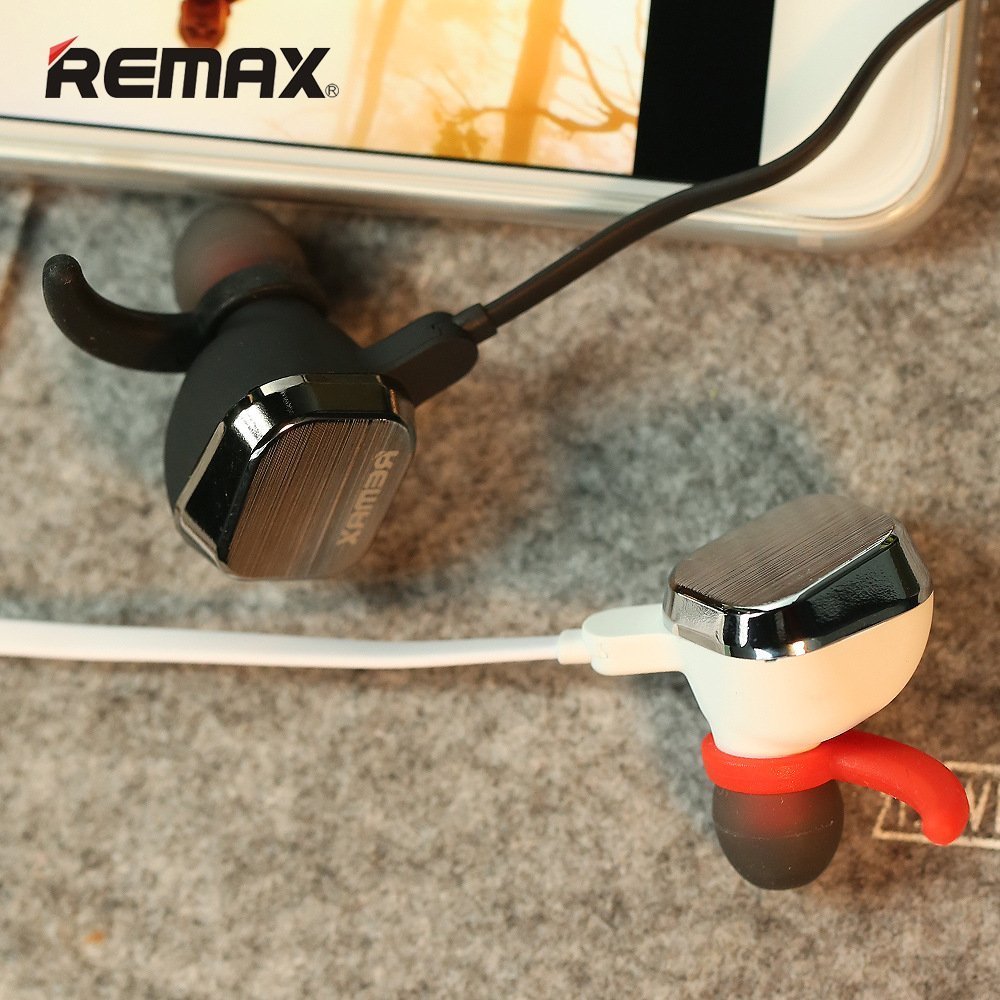 Close-up of Remax RB-S2 earbud with magnetic feature.