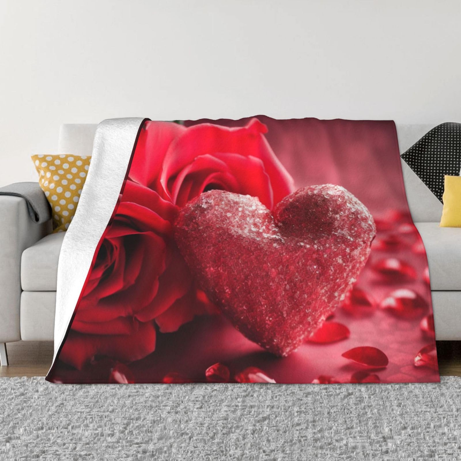 Couverture de canapé cœur rose pour des soirées cocooning chaleureuses