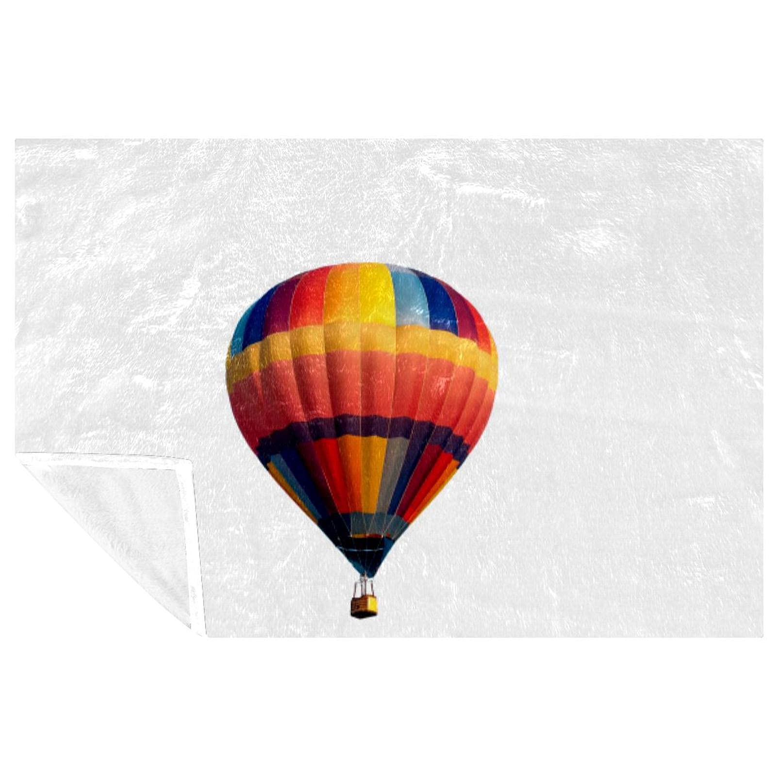 Couverture montgolfière 150x100 cm : le plaid doux idéal pour vos pique-niques et soirées canapé