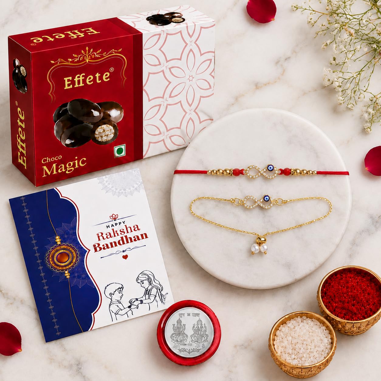DeoDap Infinity Evil Eye Rakhi for Brother and Bhabhi β Rakhi Set of 2 with Choco Magic Chocolate 32gm, Pooja Coin, Roli Chawal & Card | Gift Hamper for Raksha Bandhan 3