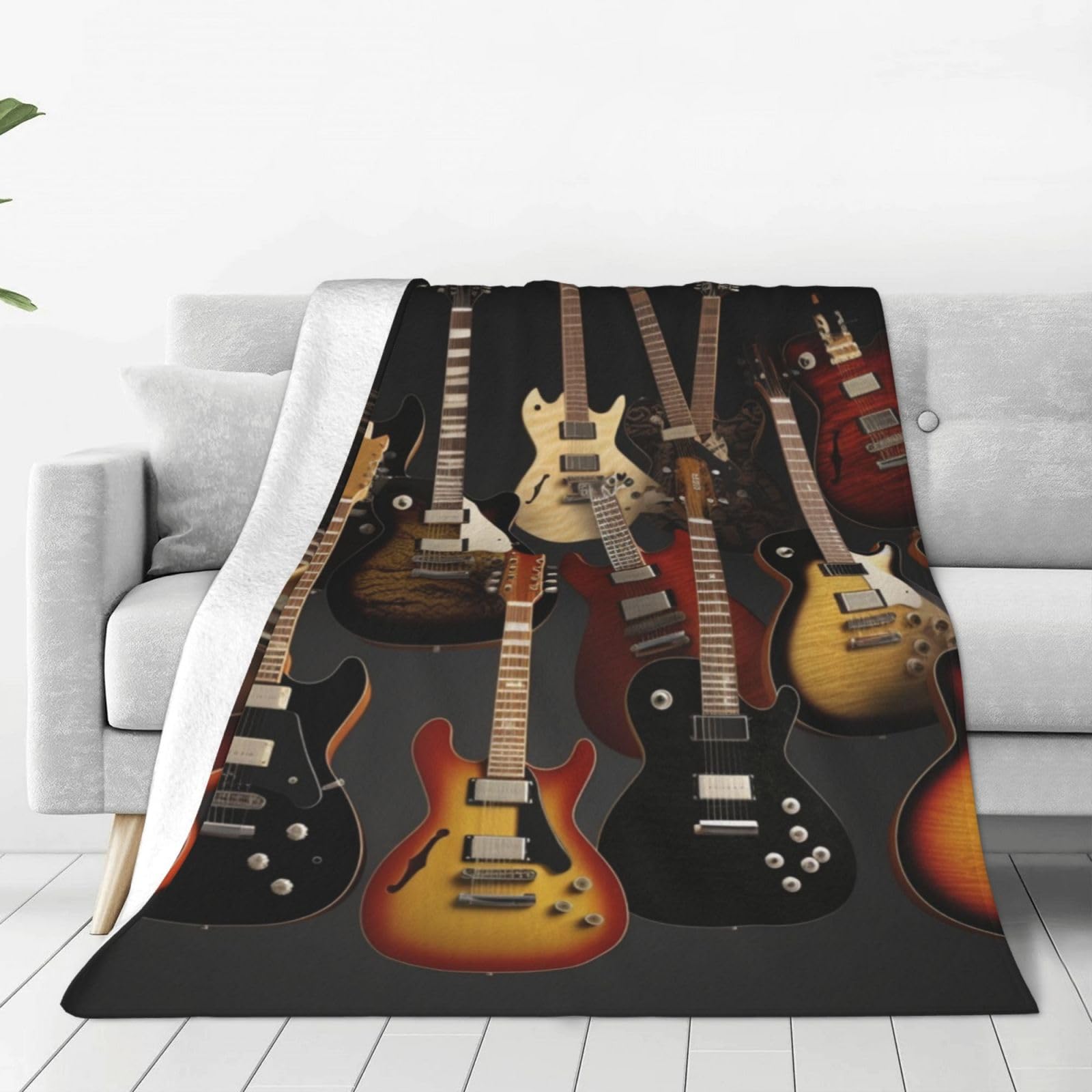 Couverture polaire guitares pour des soirées cocooning