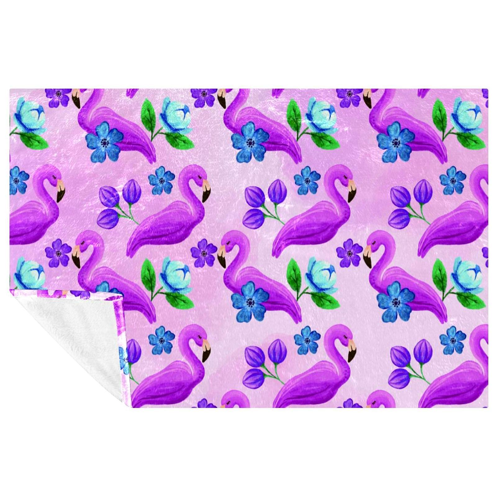 Couverture lit et canapé imprimé fleurs violettes et flamants