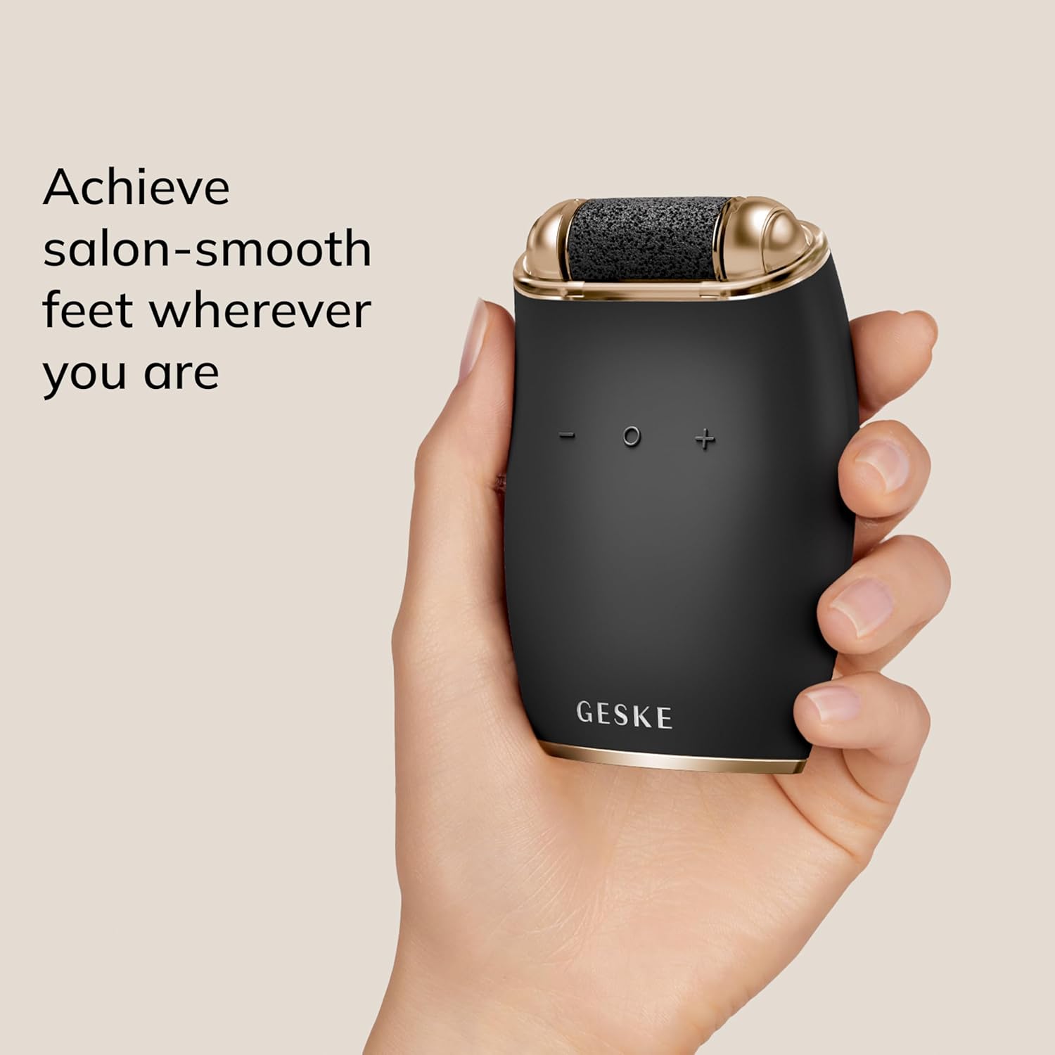 A hand holding the GESKE Electric Pumice Foot Smoothing Roller