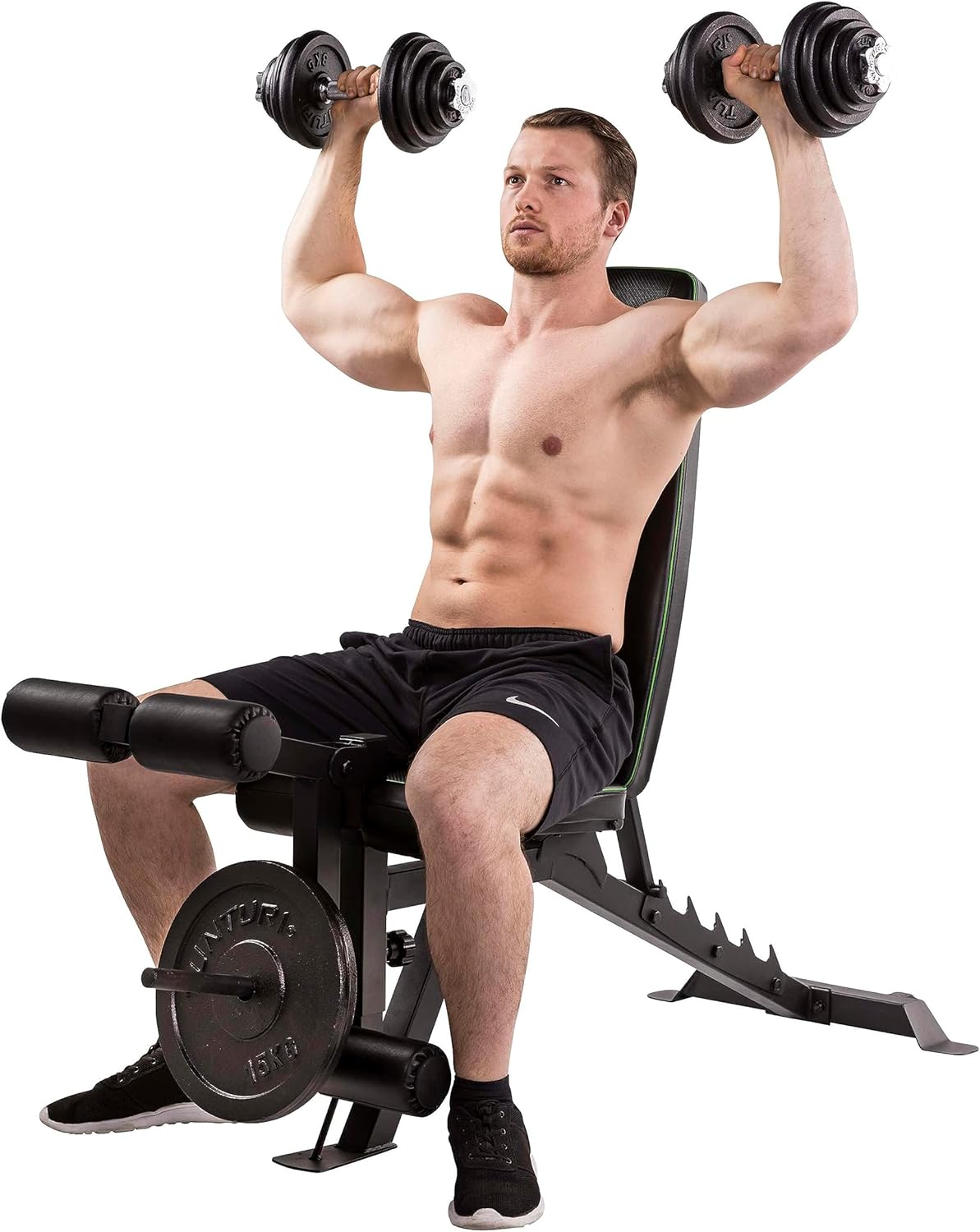 Man performing shoulder press on TUNTURI UB60 Utility Bench