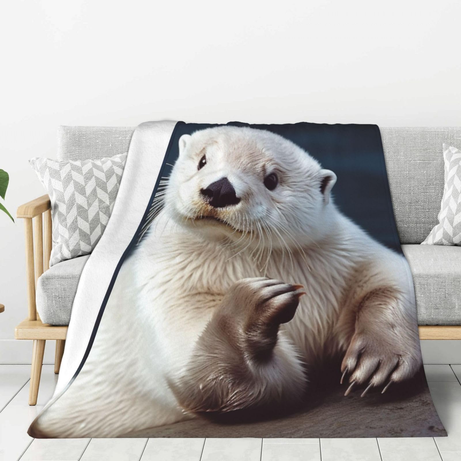 Couverture loutre en flanelle pour des soirées cocooning sur le canapé