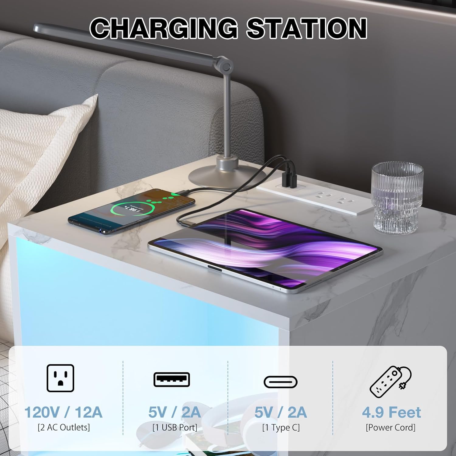 Close-up view of the integrated charging station on the nightstand's top surface, showing USB, Type-C, and AC outlets.