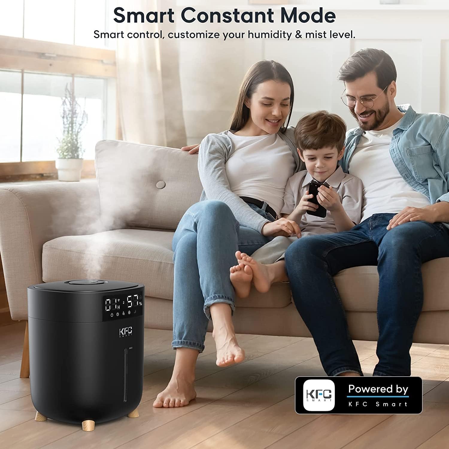 Family on a couch with the KFC WB-JS2101 Humidifier, displaying the 'KFC Smart' logo, indicating smart constant mode operation.