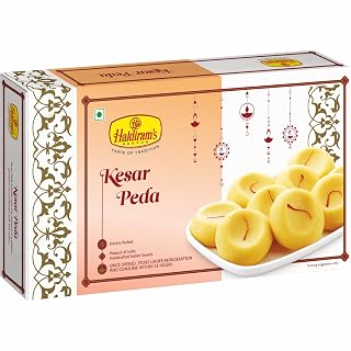 Haldiram's Nagpur Kesar Peda 250g � Flavored with aromatic saffron, this peda is rich, smooth, and perfect for special occasions