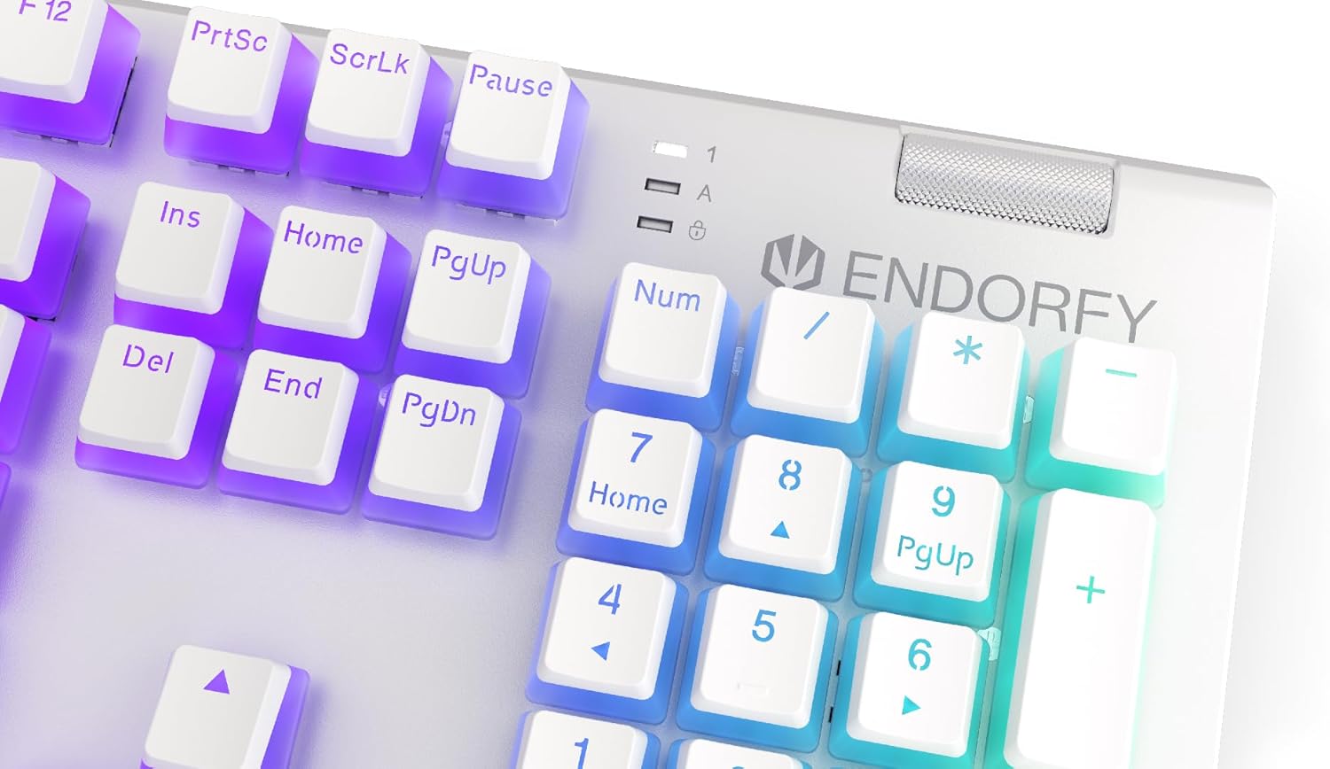 Close-up of the ENDORFY Omnis Pudding Onyx White Red keyboard's numpad and metal volume wheel.