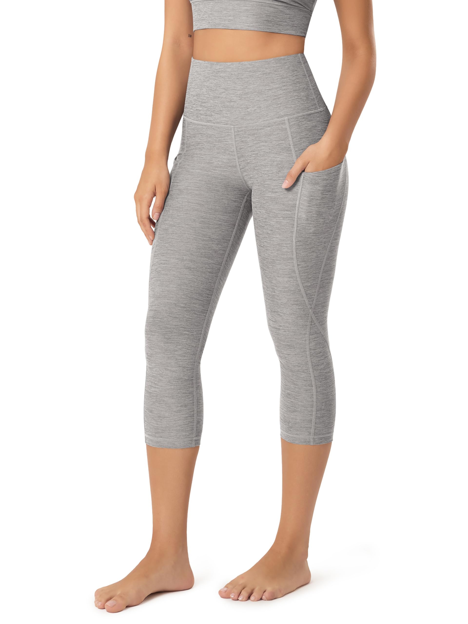 ODODOS Women's High Waisted Yoga Capris with Pockets, Tummy Control Non See Through Workout Athletic Running Capri Leggings