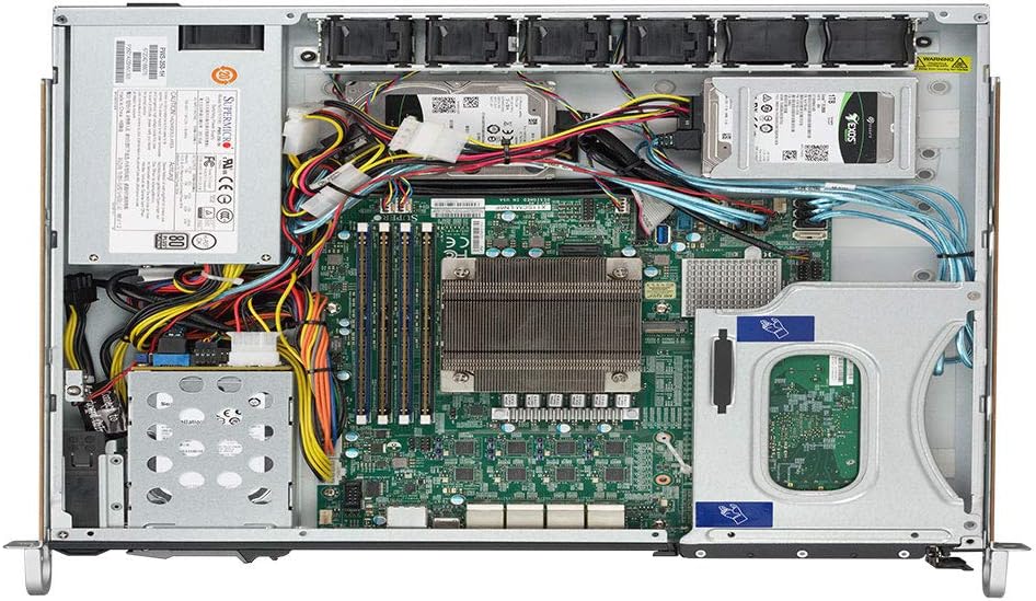 പിൻഭാഗം view of Supermicro SYS-1019C-FHTN8 server showing 8 GbE LAN ports, USB, VGA, and IPMI ports