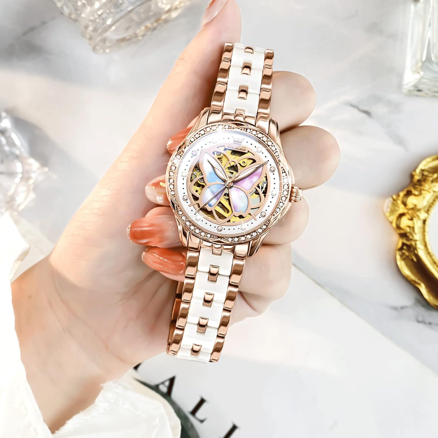 OLEVS Kadın Otomatik Kurmalı Şık Seramik Gül Altın Rengi Su Geçirmez Işıklı Kol Saatleri, Küçük Bilekler İçin Uygun - Kalp veya Kelebek Desenli (Mavi/Kırmızı/Beyaz)