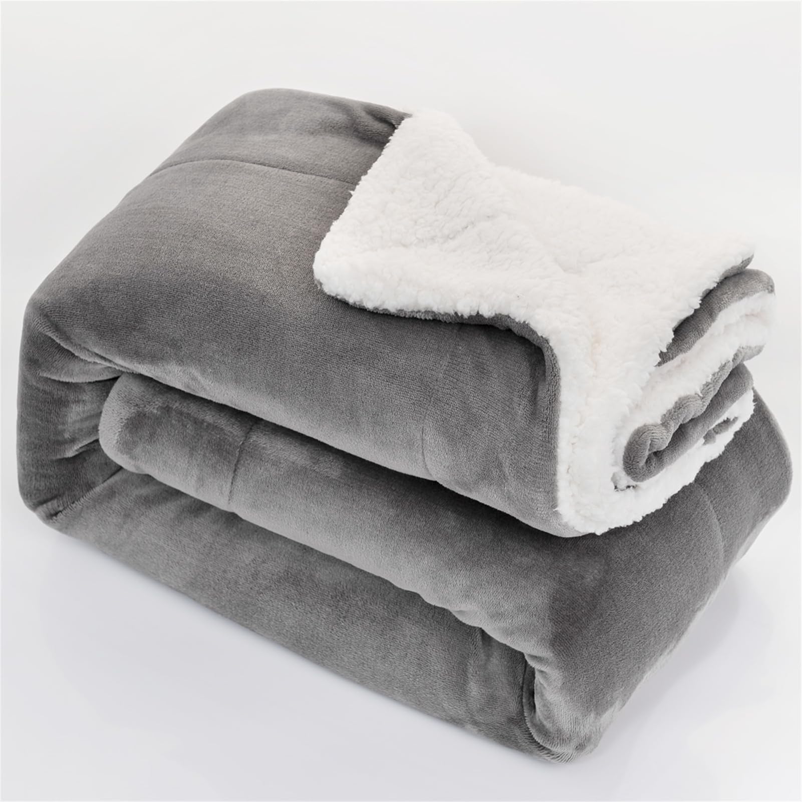 Couverture en polaire sherpa moelleuse pour vos soirées canapé