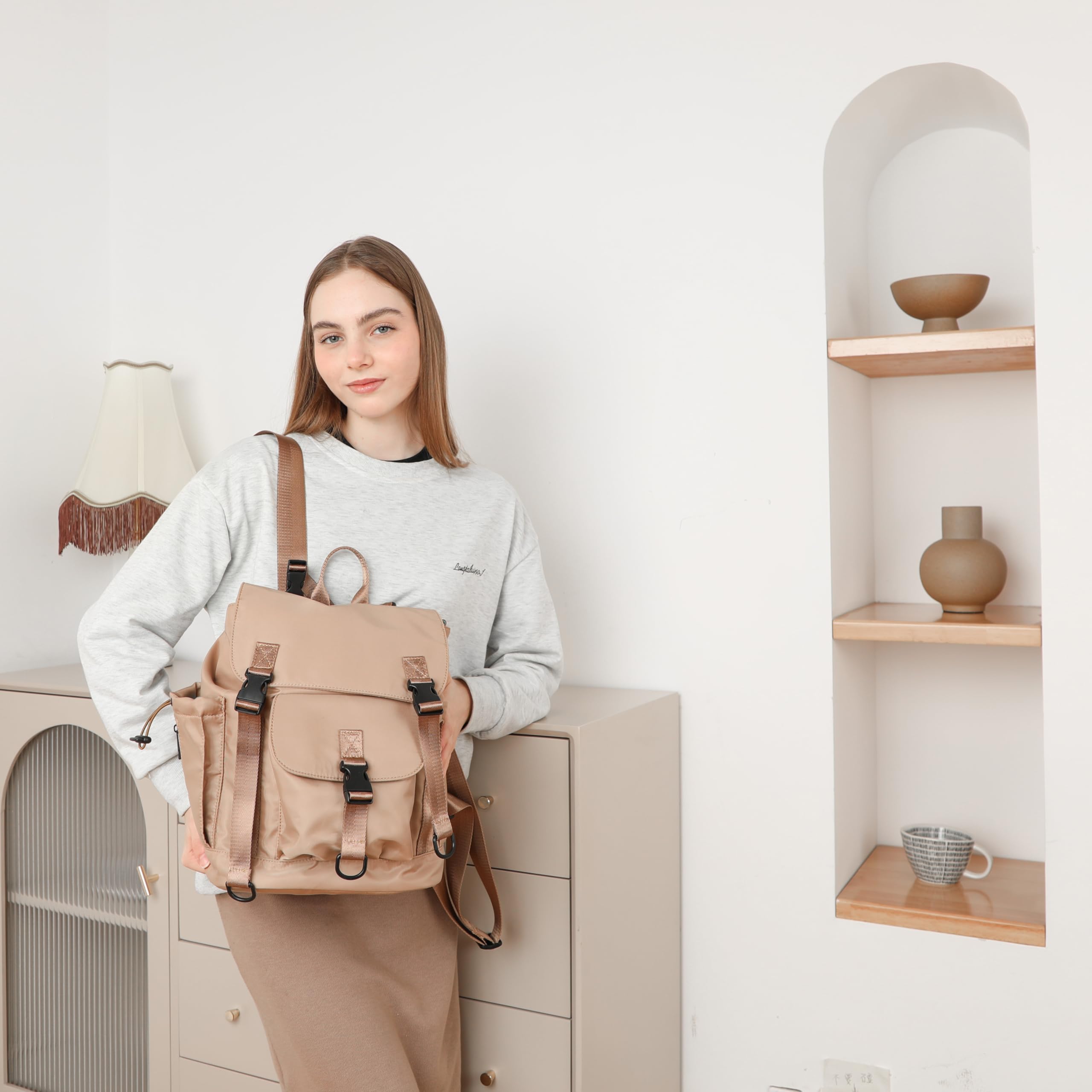 MOMINSIDE Mochila pequeña para pañales, bolsa de viaje para bebé con 9 bolsillos para mamá y papá