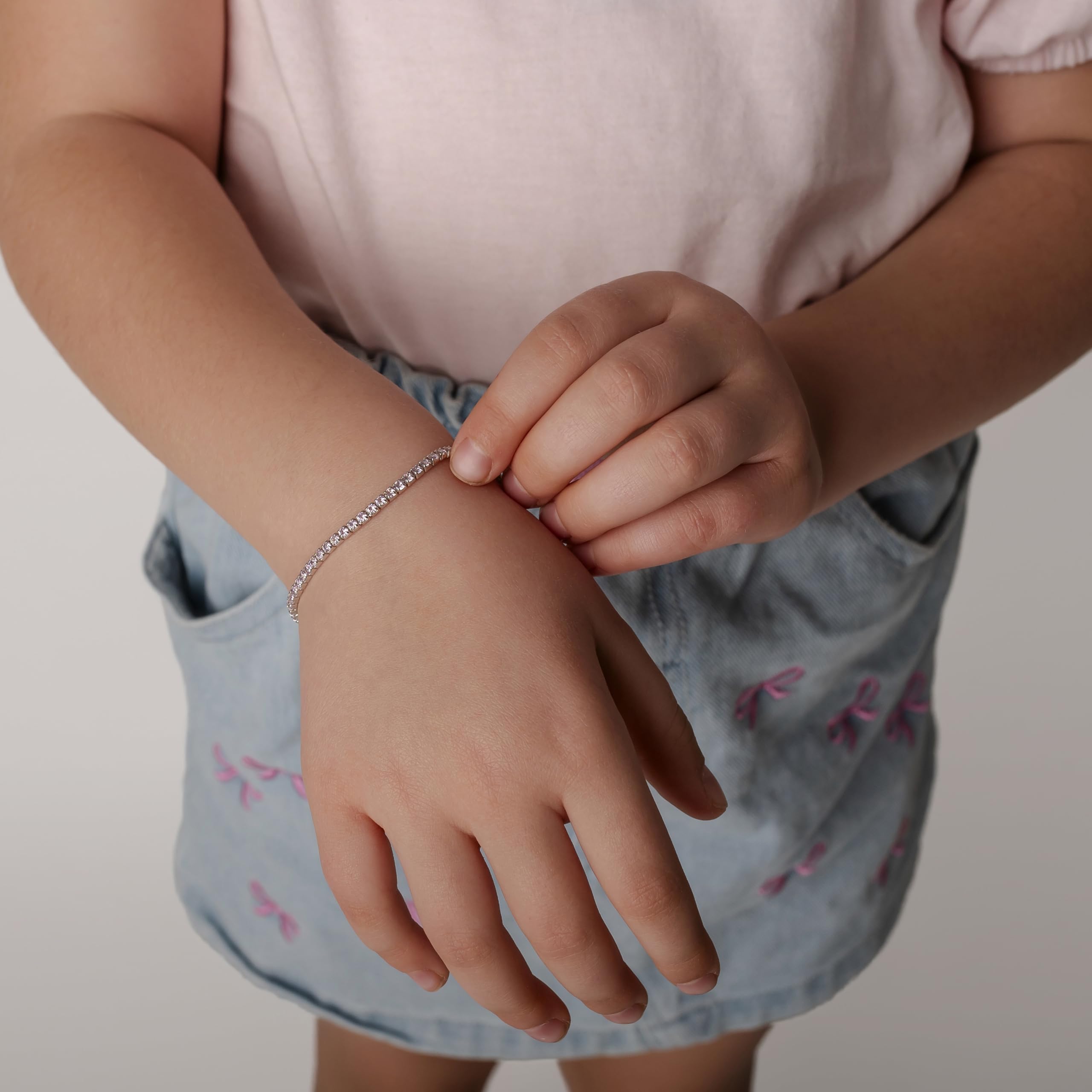 Sakrami Bracciale Tennis Bambina in Argento 925 + Zirconi Bianchi Brillanti + Chiusura Regolabile + Gioiello Elegante per Regalo + Nascita + Battesimo + Comunione + Compleanno