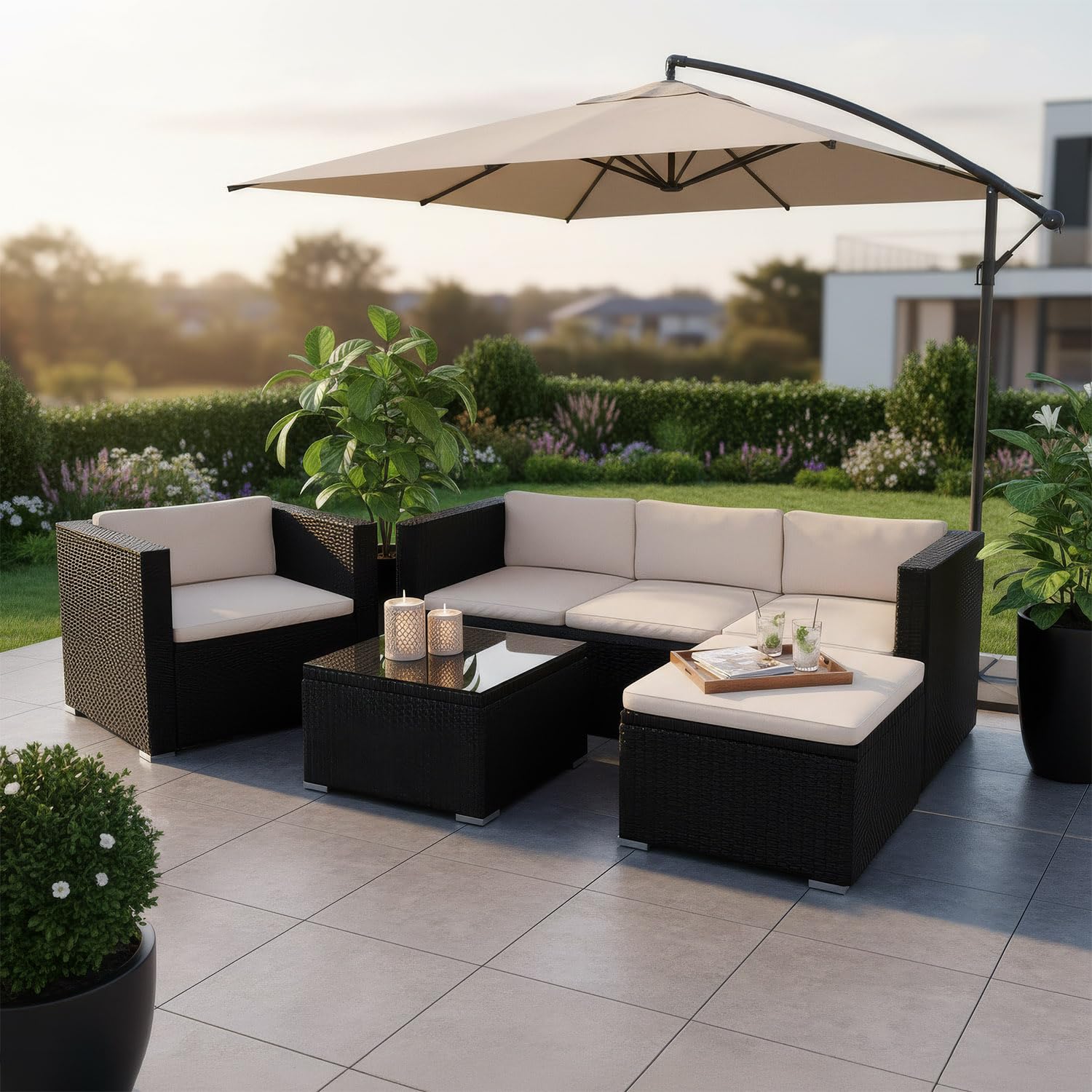 Juskys Lounge in polyrattan Punta Cana L resistente alle intemperie con divano, poltrona, sgabello, tavolo e cuscini - 4-5 persone - set di mobili da giardino lounge nero/crema