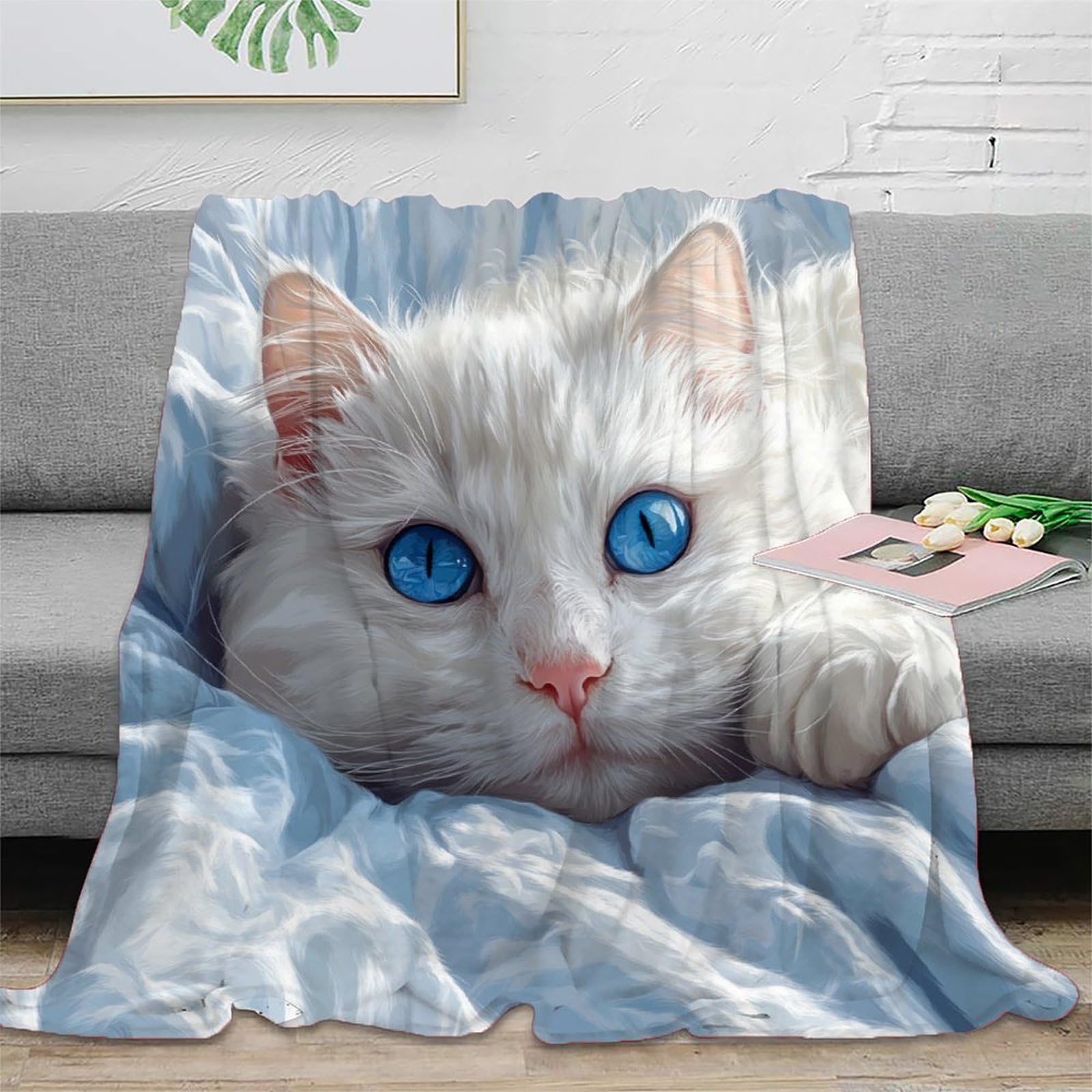 Couverture chat blanc anti-bouloche : un plaid doux pour studio et locataire
