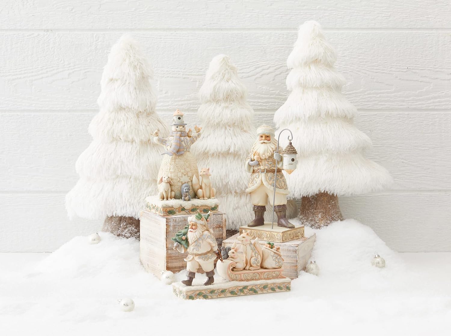 Enesco Jim Shore Heartwood Creek White Woodland Santa Pulling Animals on Sled Figurine, 6.89 Inch, Multicolor