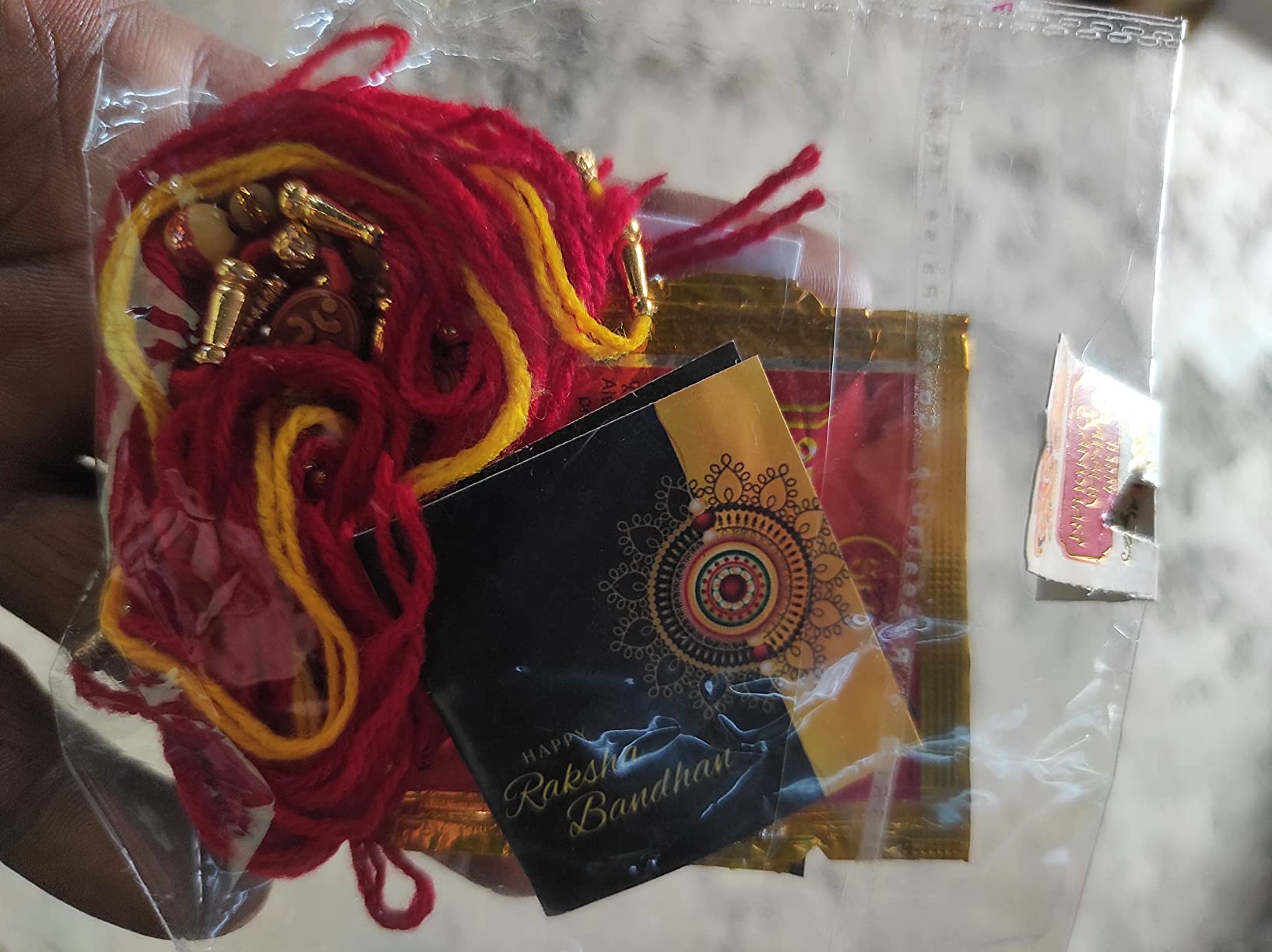 KARTIK Dora Rakhi Set For Brother & Bhabhi – Includes 6 Rakhis, Roli Chawal Bottles, Greeting Card, Traditional Indian Festival Gift - View #8