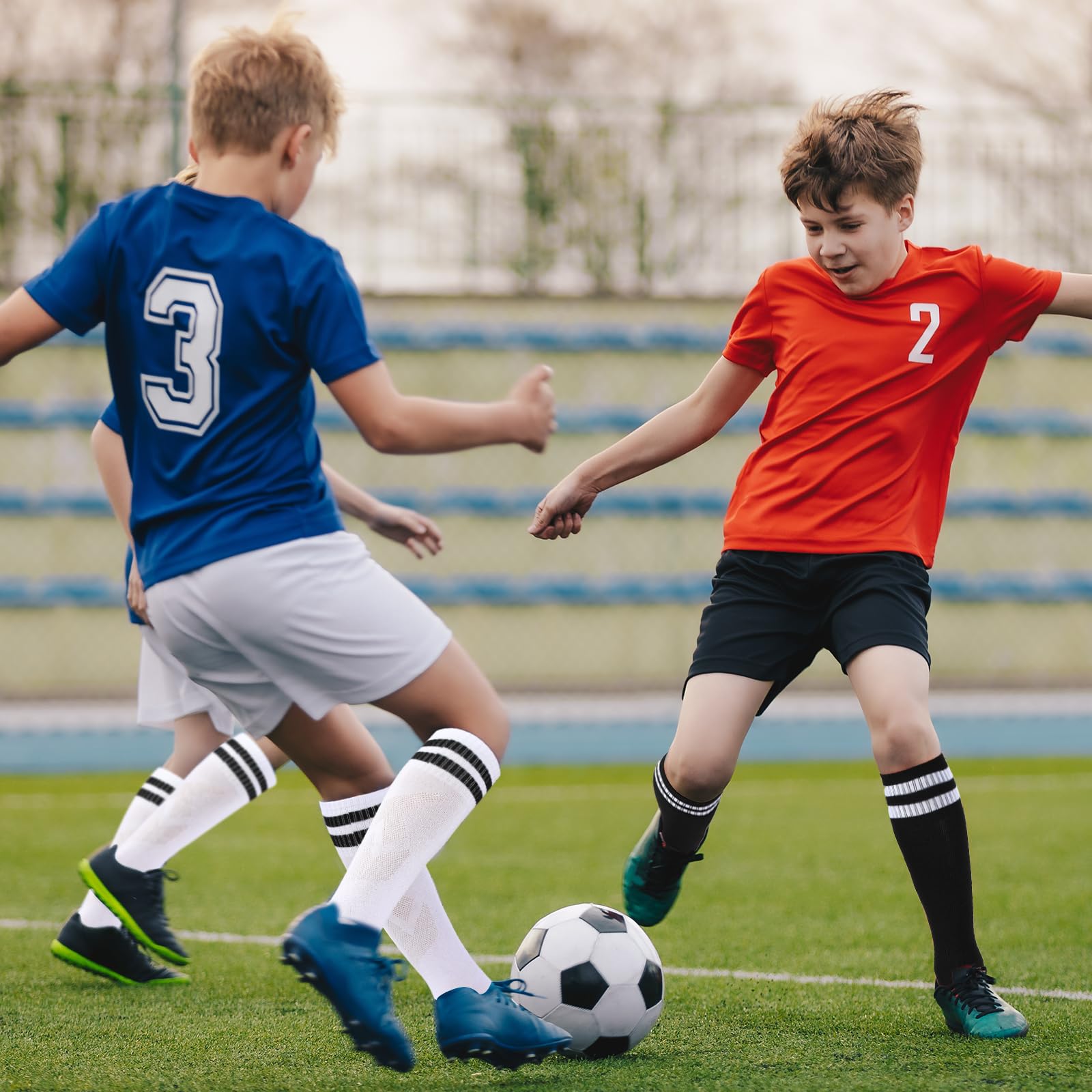Xtinmee 24 pares de calcetines de fútbol para niños, elásticos, a rayas, hasta la rodilla, calcetines deportivos de fútbol para niños y niñas de 7 a 13 años