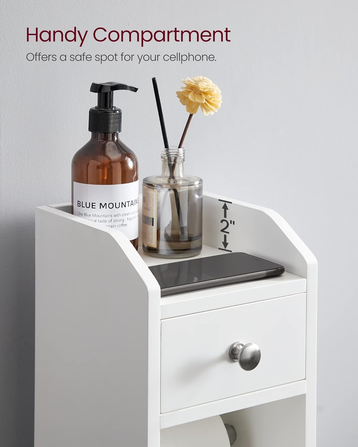 Close-up image of the top compartment holding a mobile phone, a soap dispenser, and a diffuser.
