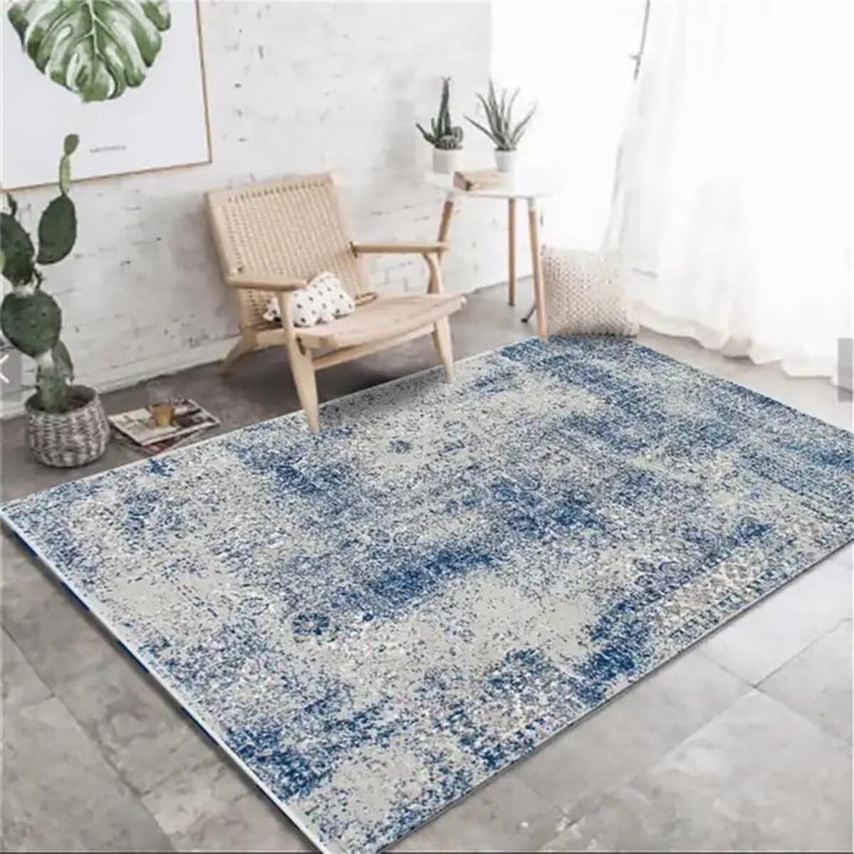 Tapis de chambre design bleu parfait près du canapé du salon