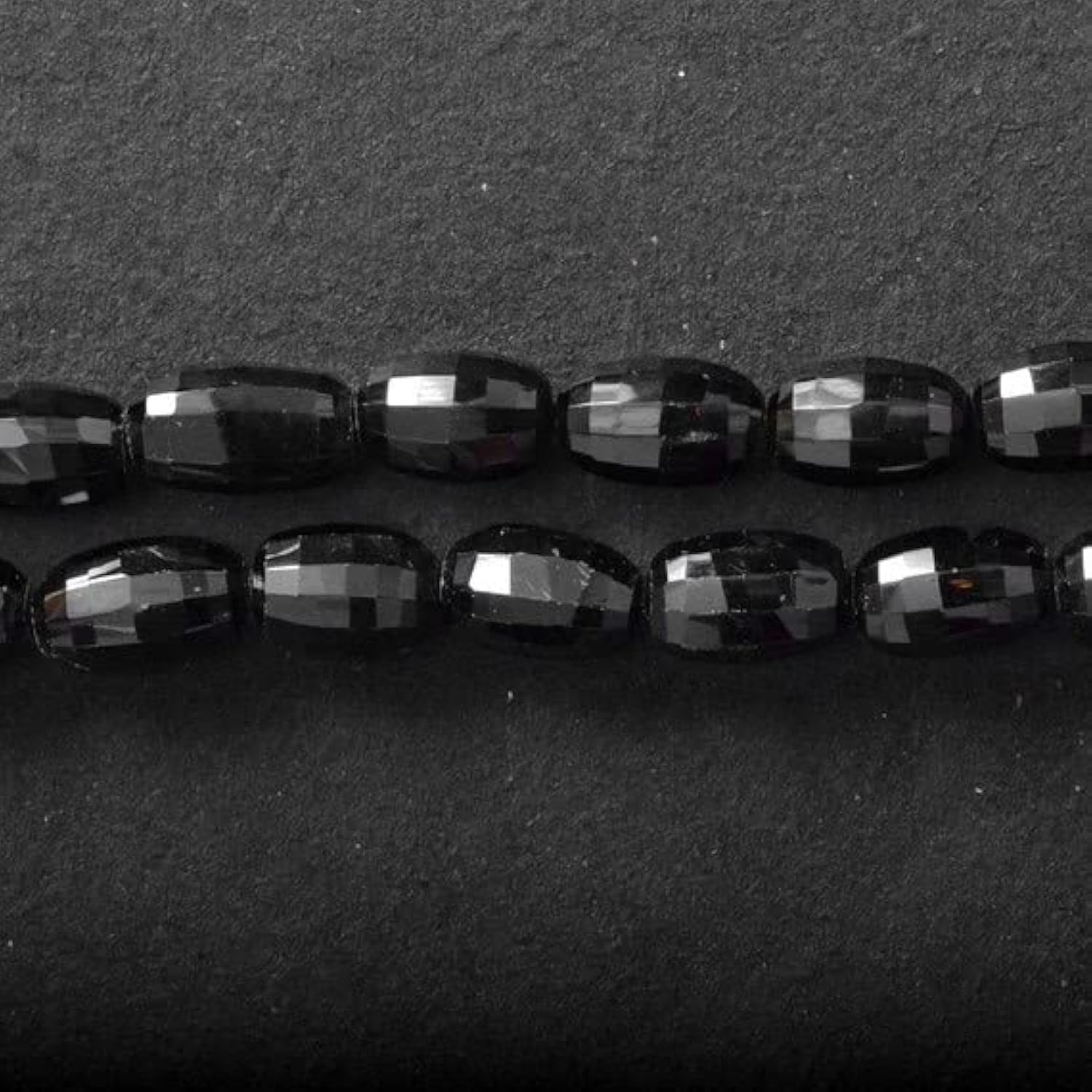 Perles spinelle noir facettées forme cylindre 11-14mm, style minimaliste pour bijoux du quotidien