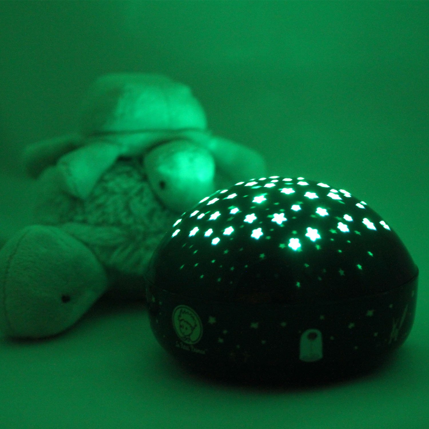 Night light projecting green stars