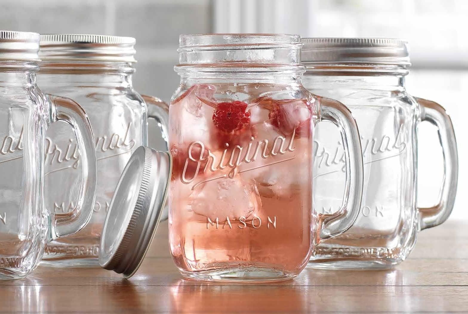 Glaver's Mason Jar 16 Oz. Glass Mugs with Handle and Lid Set Of 4 - Home Essentials & Beyond - Old Fashioned Drinking Glass Bottles Original Mason Jar Pint Sized Cup Set.