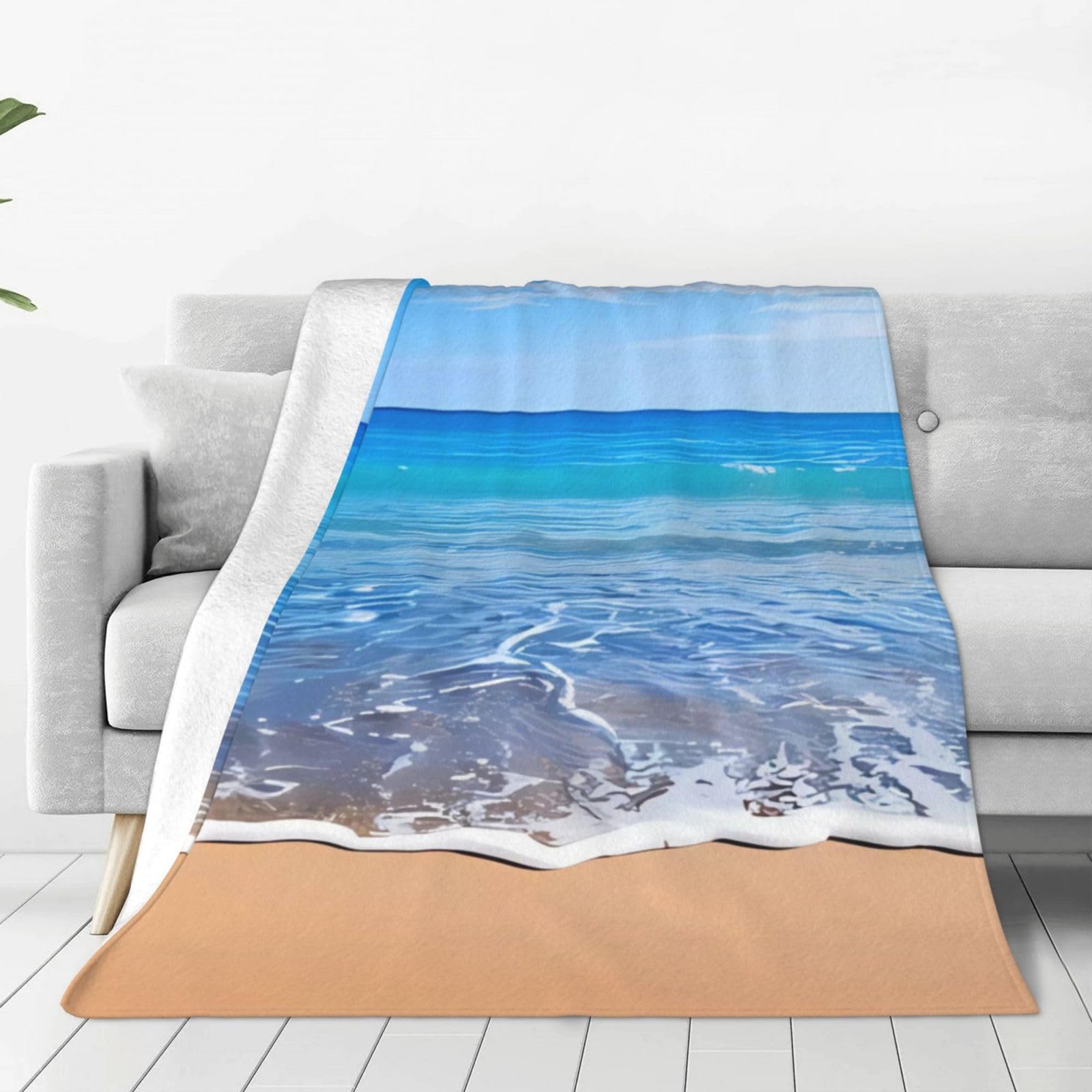 Couverture de plage et de mer pour ne plus avoir froid en terrasse ou sur votre canapé