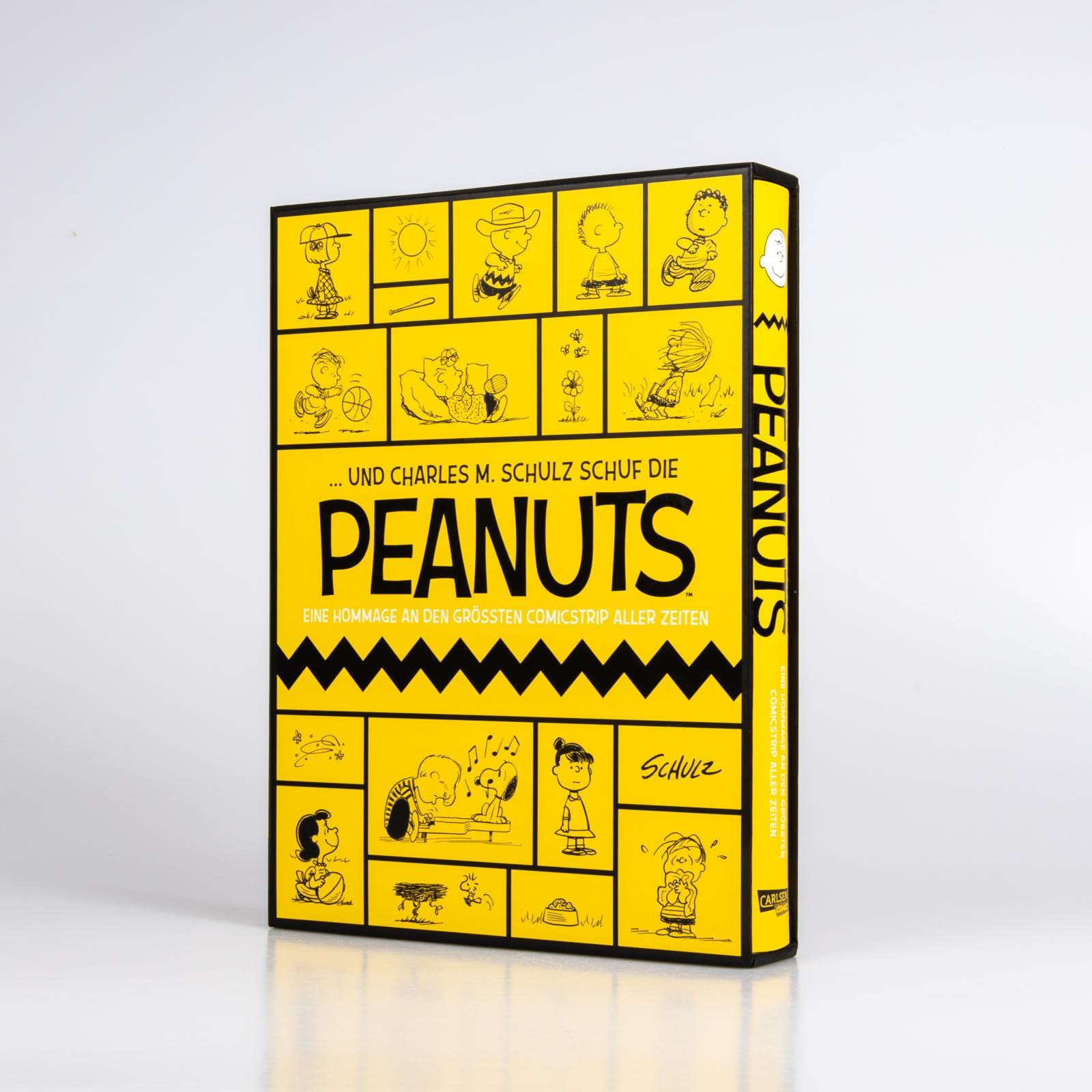 ... Und Charles M. Schulz schuf die Peanuts: Eine Hommage an den größten Comicstrip aller Zeiten | Hochwertige Luxusausgabe im Schuber (Peanuts Deluxe)