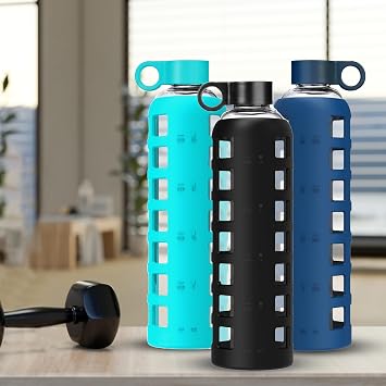 purifyou Glass Water Bottle Collection with Time & Volume Indicators This set includes 32oz reusable bottles in sophisticated Chinese Porcelain, Aqua Blue, and Jet Black.