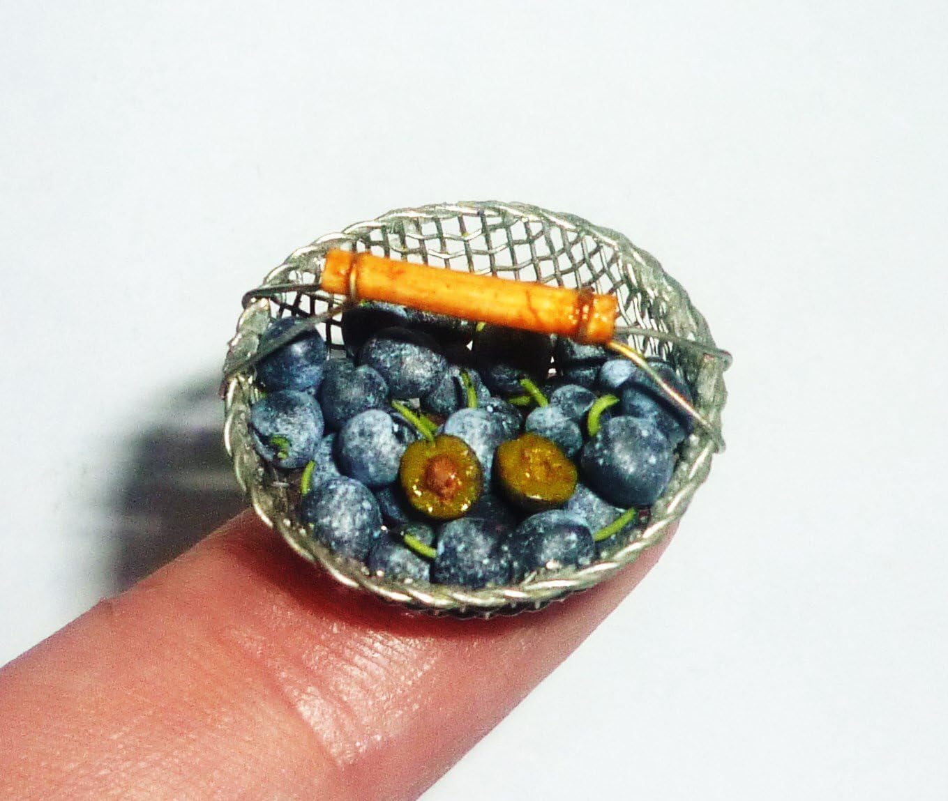Plums, plums in a colander, fruit. Dollhouse miniature 1:12