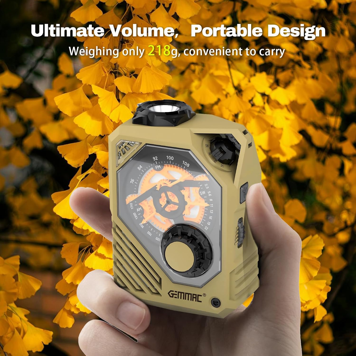 A hand holding the compact Gemmac Portable Emergency Radio, emphasizing its ultra-portable design.