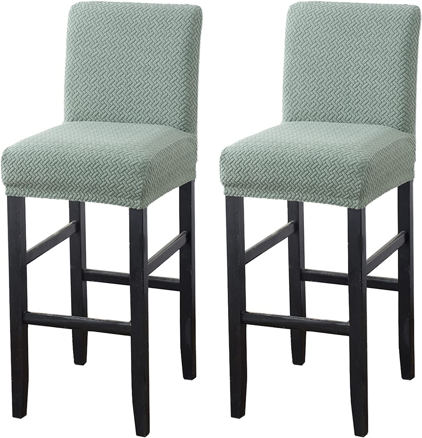 Housse de chaise extensible en jacquard vert pour protéger vos repas de famille