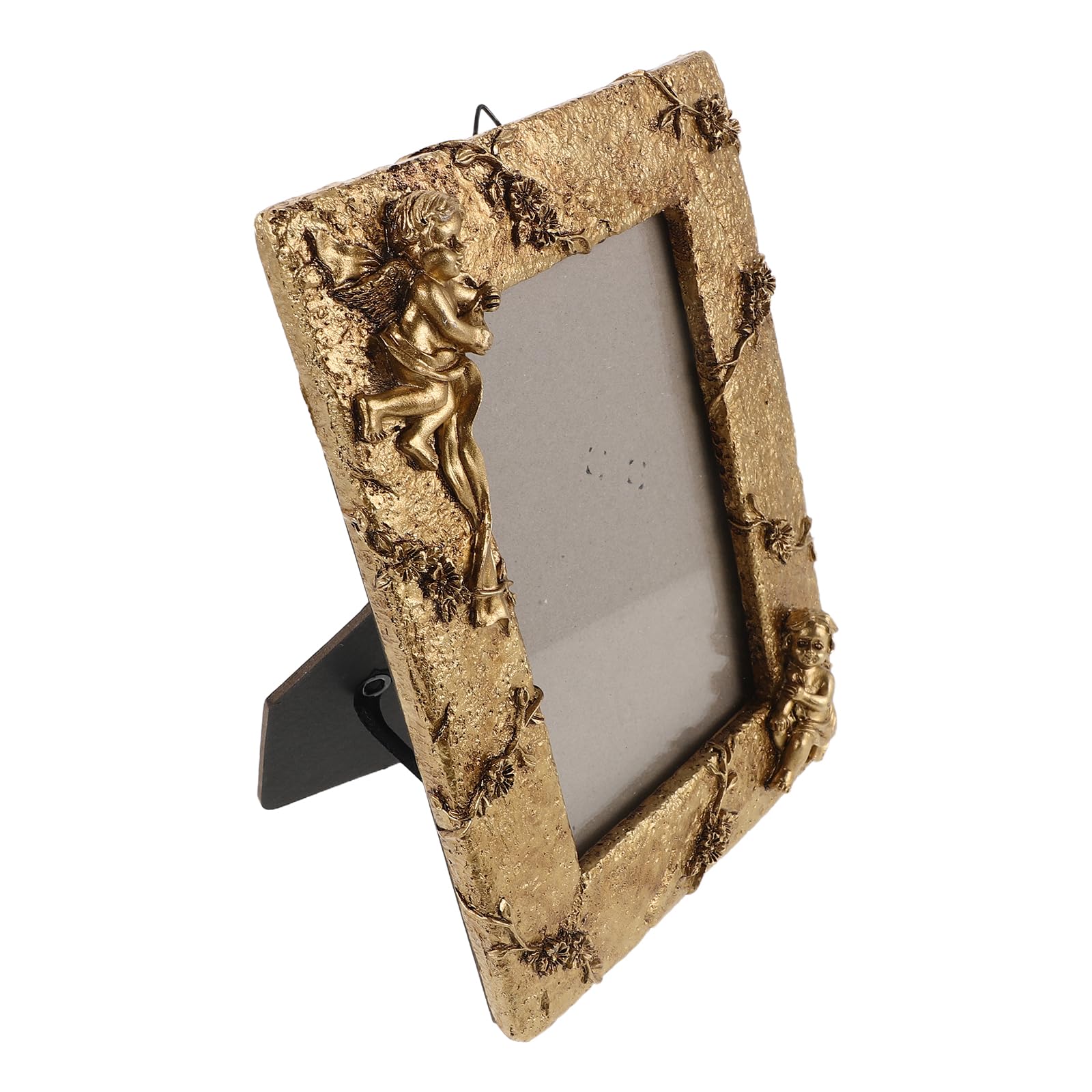 Cadre ancien doré orné avec motif d'ange pour ambiance rétro chic