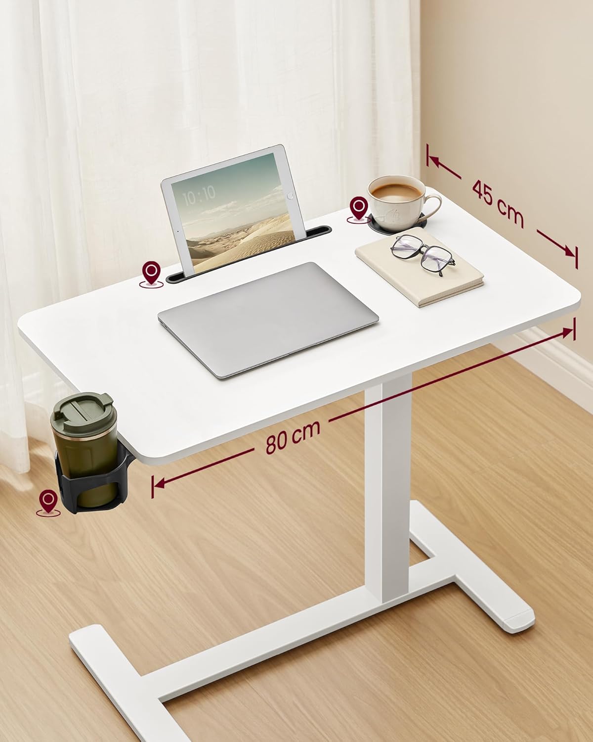 Arriba abaixo view of the table showing its dimensions, integrated cup holders, and tablet slot.