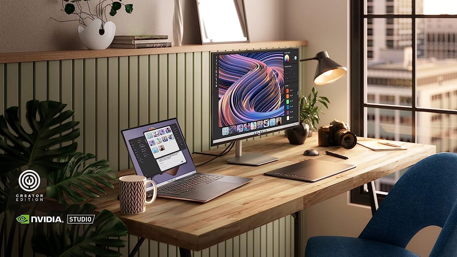 Dell XPS 15 9520 laptop in a creative workspace with an external monitor.