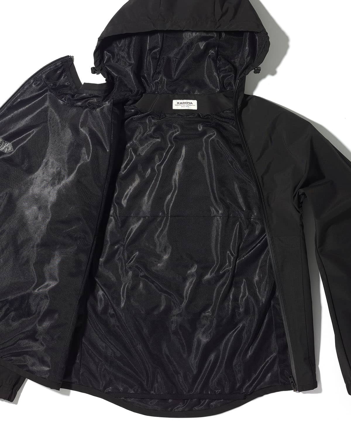Amazon | [カドヤ] ジャケット ROUND ZIP ANORAK ブラック Lサイズ 