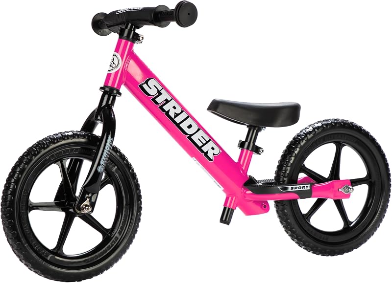 Strider 12 Sport Bike, Pink - No Pedal Balance Bicycle for Kids 1 to 4 Years - Includes Safety Pad, Padded Seat, Mini Grips, Flat-Free Tires -Easy Assembly, Tool-Free Adjustments | No-Pedal Balance Bike for Toddlers, Safety Pad, Adjustable Seat and Handlebars, Lightweight Frame, Never-Flat Tires