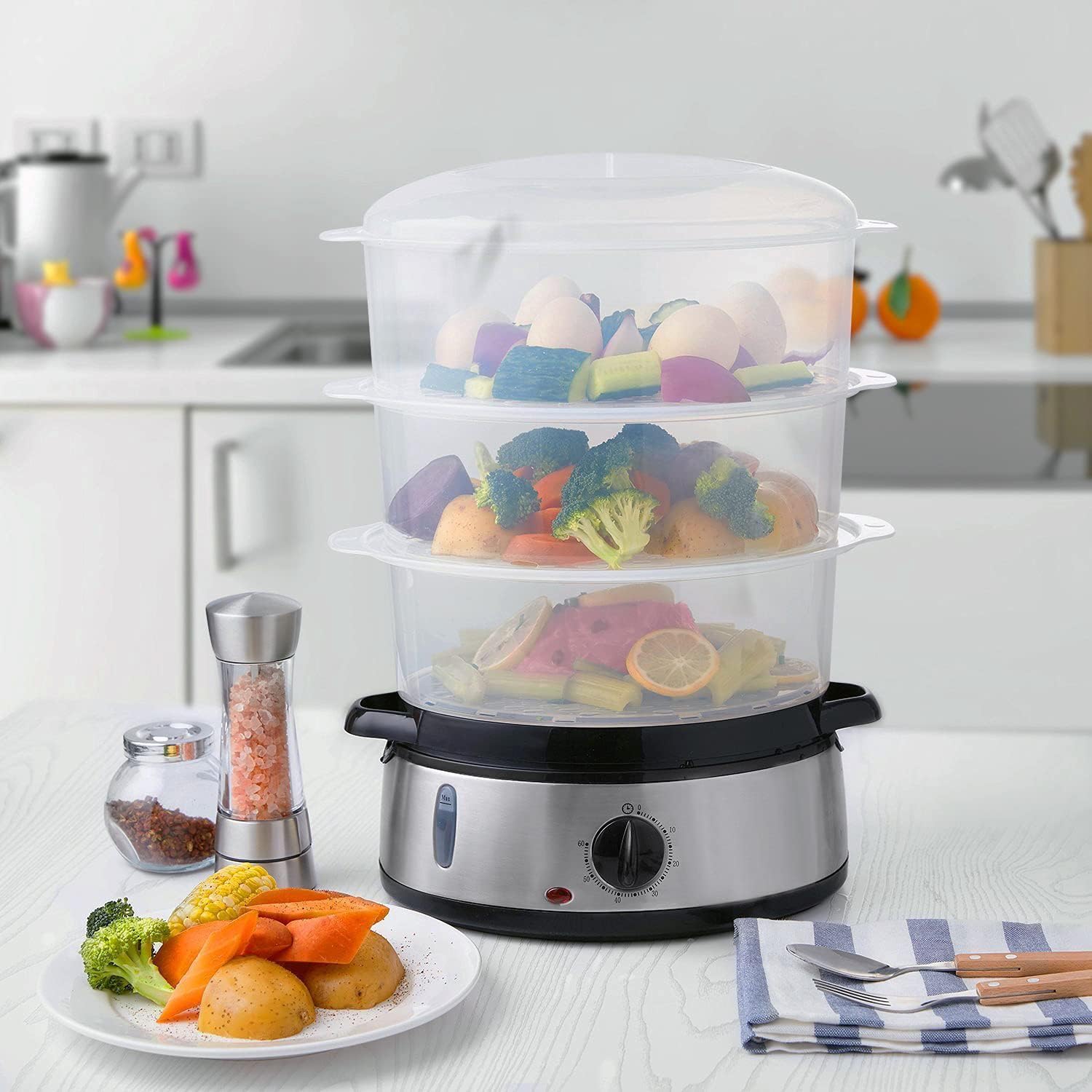 Aquila VE4401 Electric Food Steamer in kitchen with cooked food