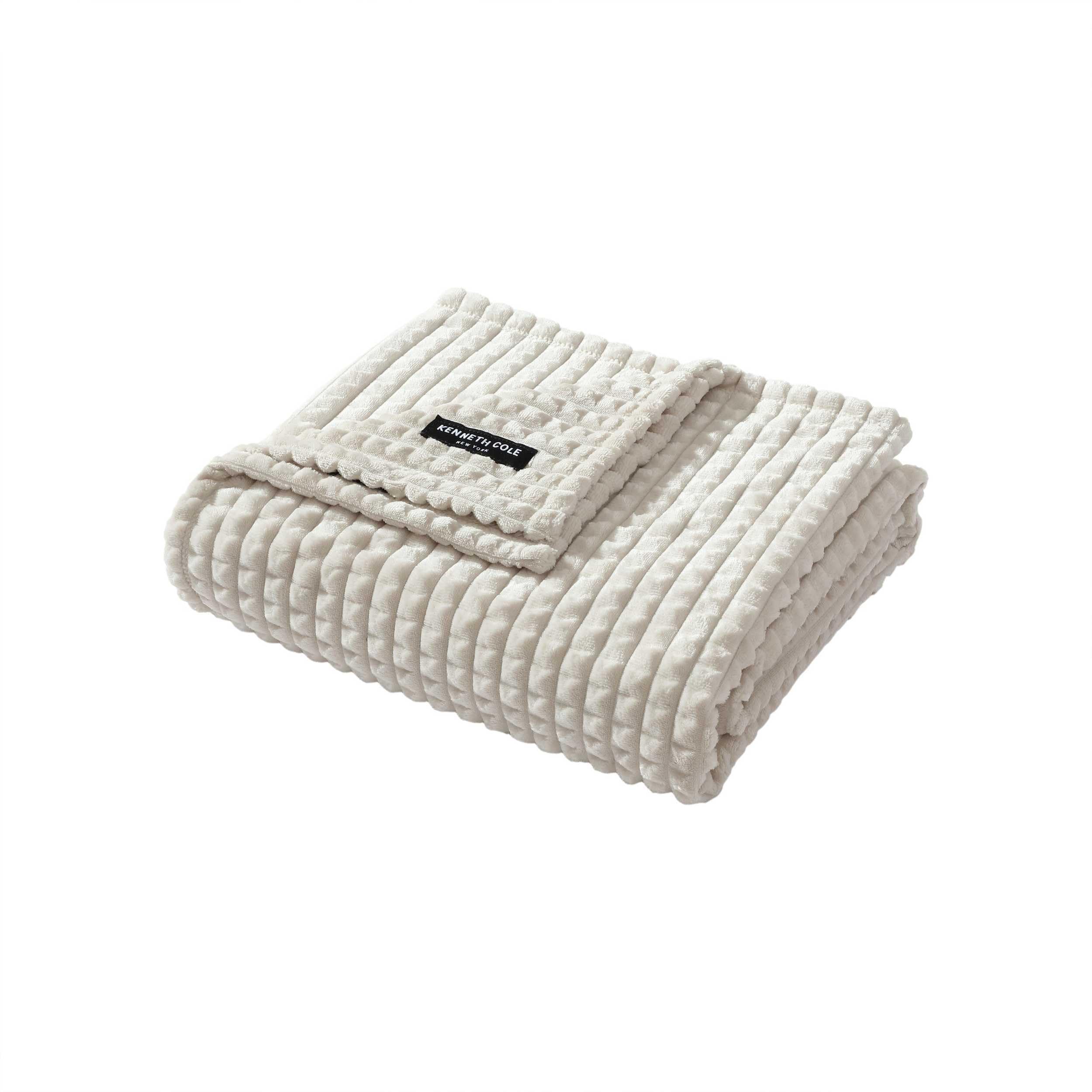 Couverture en peluche jacquard beige Kenneth Cole 127x152 cm pour un canapé élégant