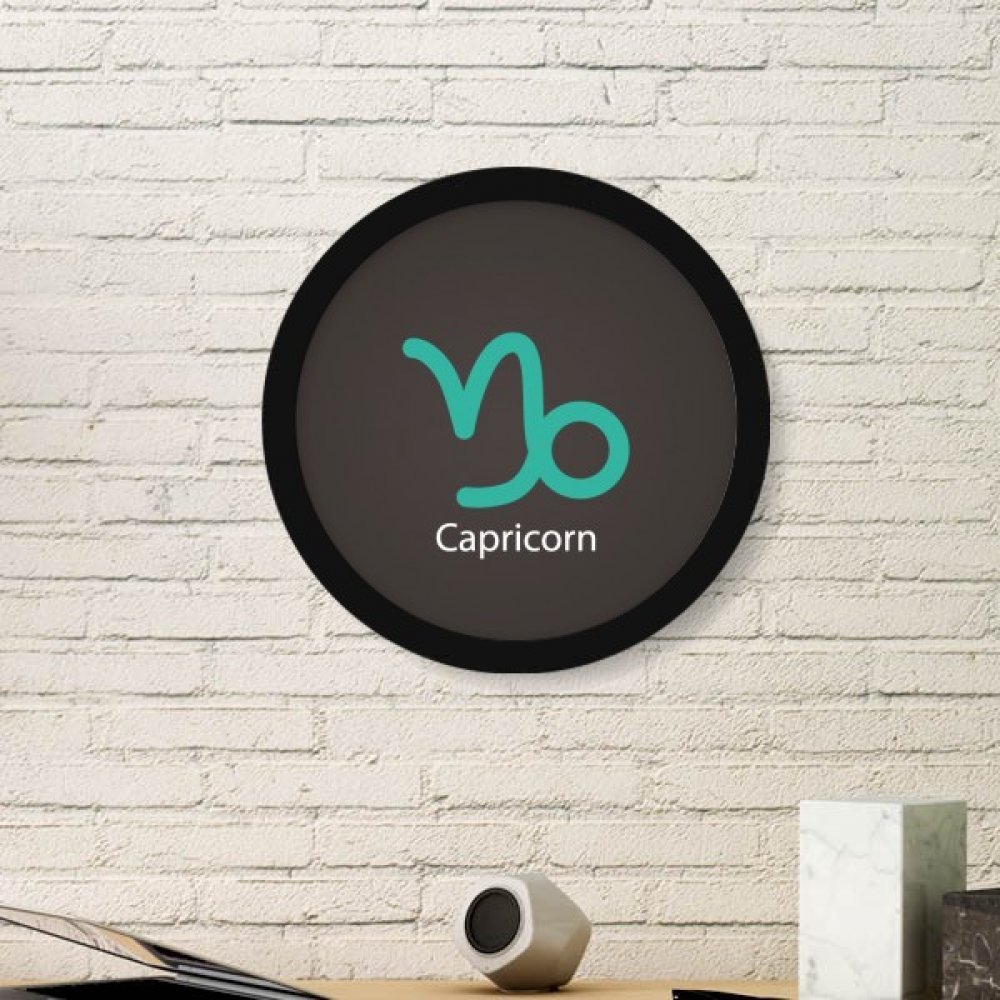 Cadre photo Capricorne rond noir pour habiller un mur vide sans effort