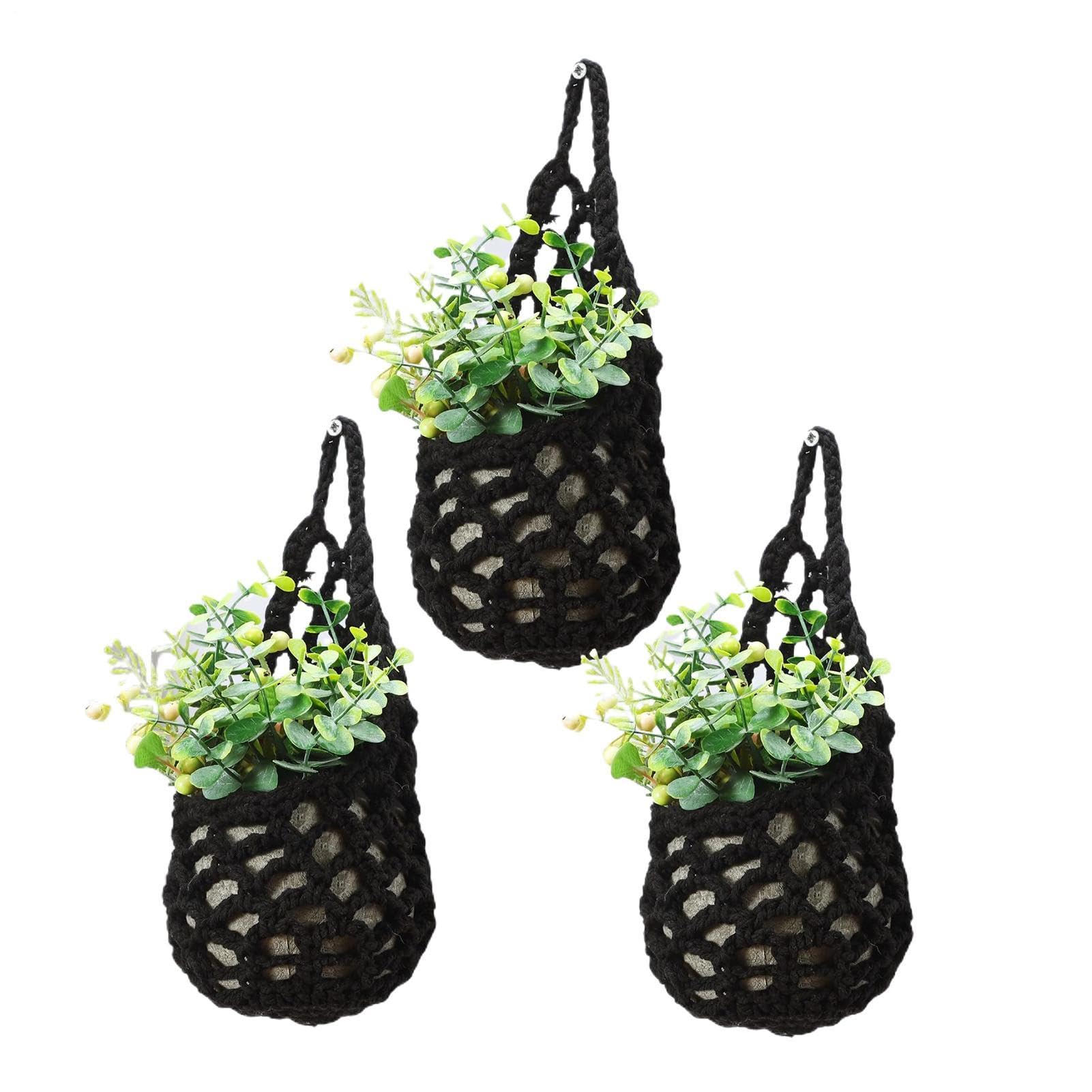 Sacs en filet tissé suspendus en corde style boho déco murale